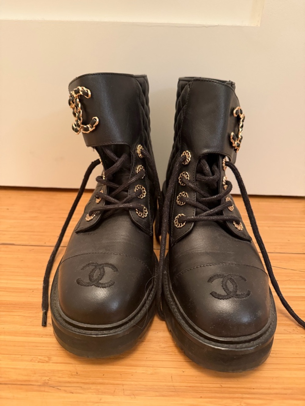 CHANEL Black Leather Quilted Ankle Boots with Gold Chain Accents - Picture 2 of 7